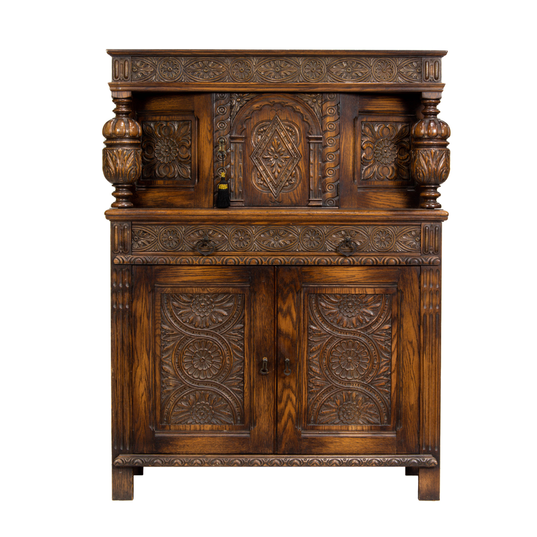 A JACOBEAN STYLE CUPBOARD A