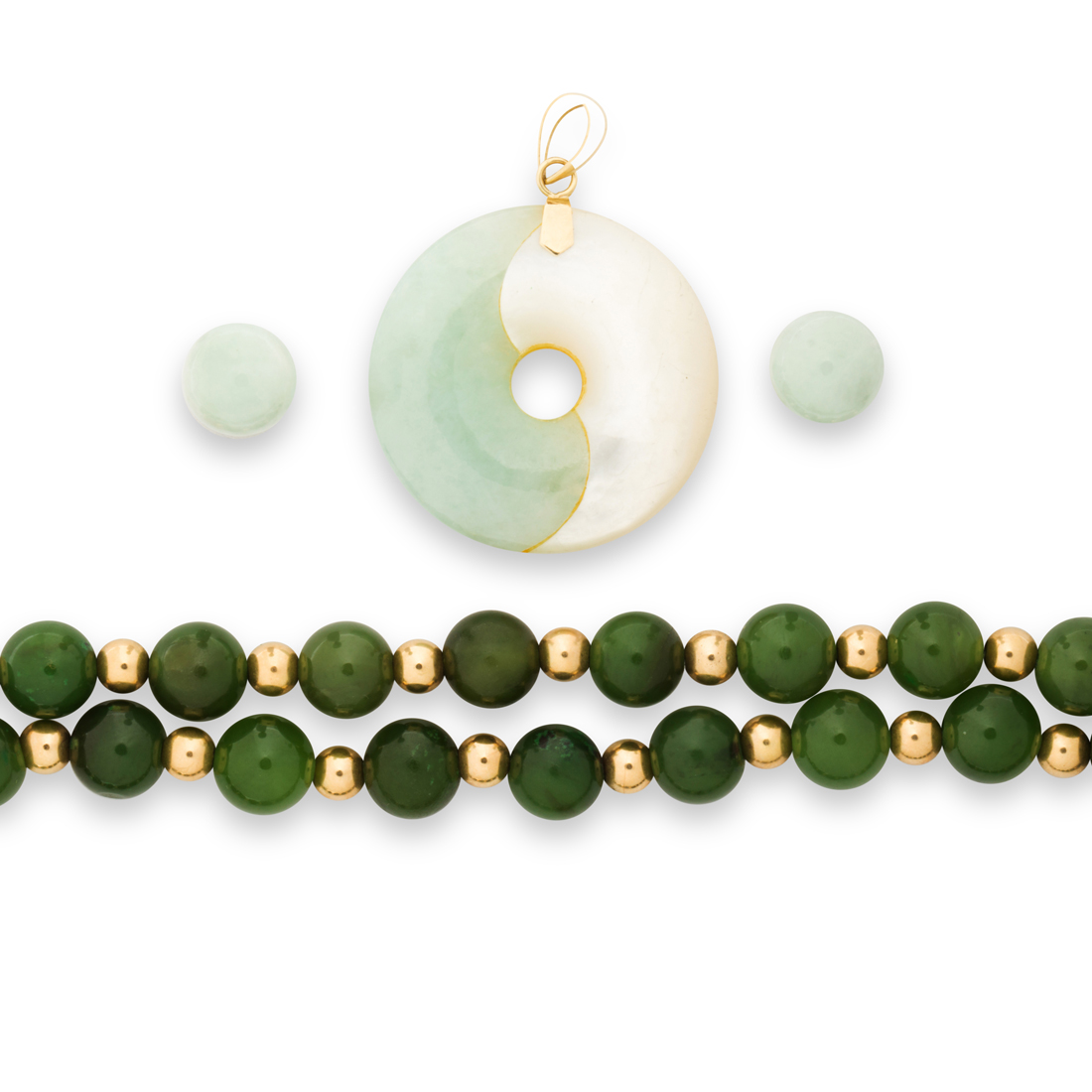 A JADE AND FOURTEEN KARAT GOLD
