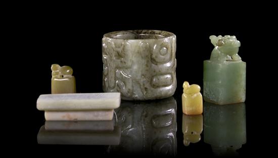 A Jade Archer's Ring and Three