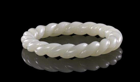 A Jade Bangle with Twist Carving of