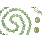 A JADE BEAD NECKLACE AND MATCH
