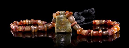 A Jade Bell-Form Toggle of dark