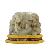 A JADE CARVED FIGURE BOULDER O
