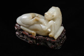 A JADE CARVED LYING HORSE<br>A