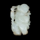 A JADE FIGURE CARVINGCarved wi