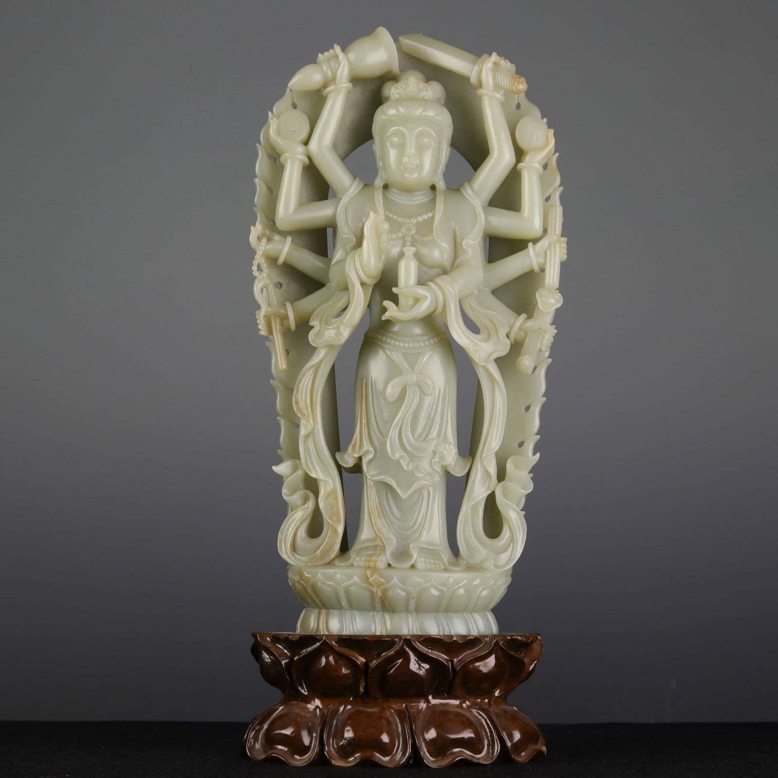 A JADE GUANYIN BUDDHA STANDING