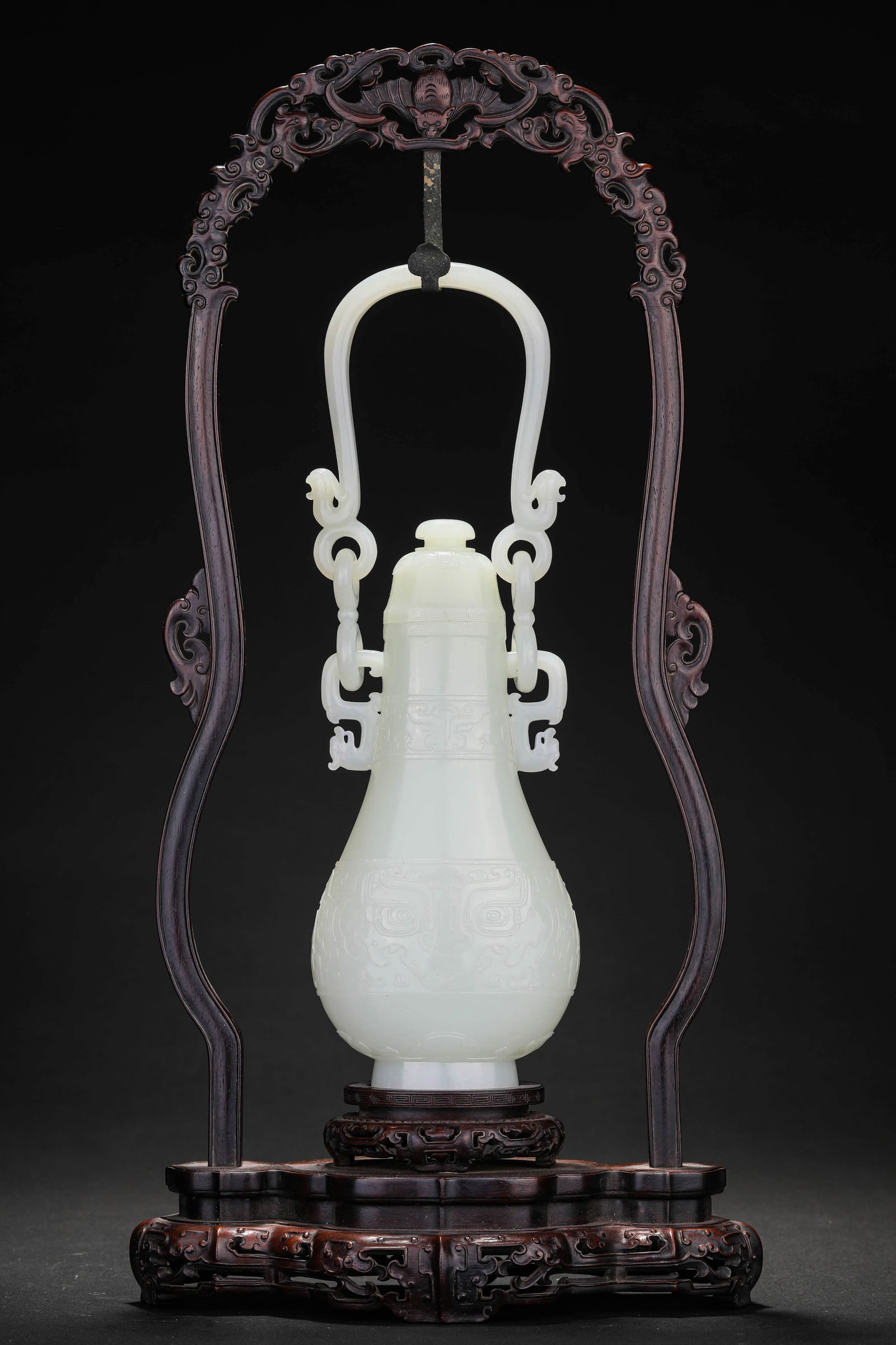 A JADE 'TAOTIE' EWER WITH ZITAN