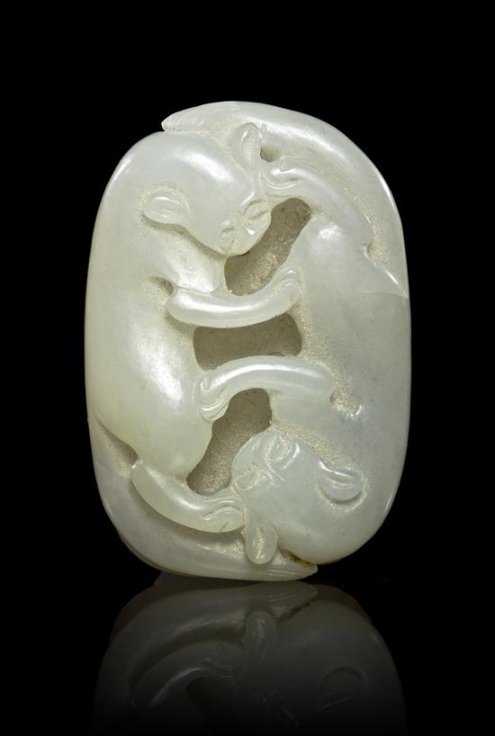 A Jade Toggle of Two Beasts of oval