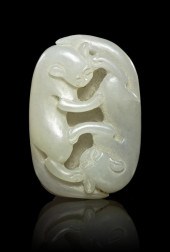 A Jade Toggle of Two Beasts of