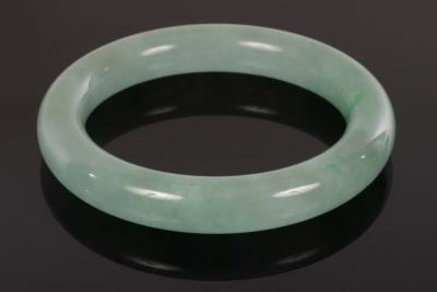 A jadeite bangle, 20th Century,
