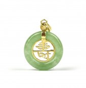 A JADEITE PENDENT WITH GOLD "S