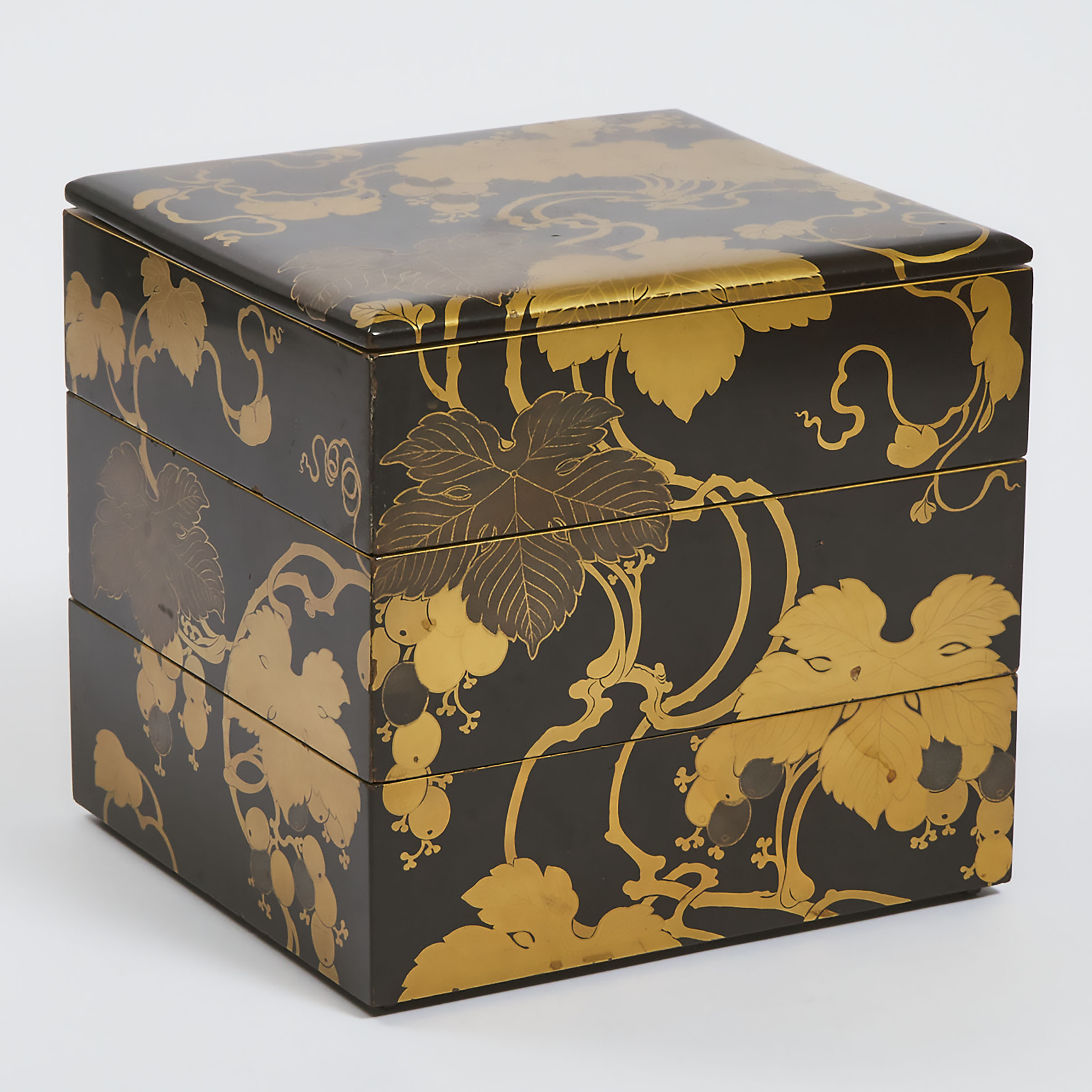 A Japanese Black Lacquer Three-Tier