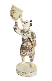 A JAPANESE BONE STANDING SAMUR
