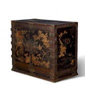 A JAPANESE BRASS MOUNTED BLACK