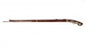 A JAPANESE BRASS MOUNTED MATCH