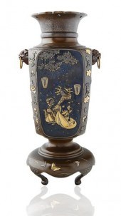 A JAPANESE BRONZE AND SHAKUDO