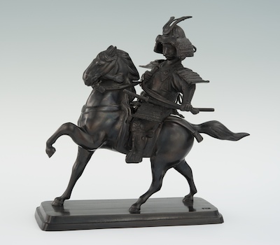 A Japanese Bronze Equestrian