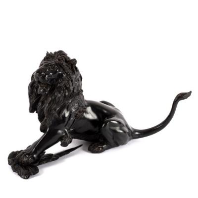 A Japanese bronze figure of a lion,