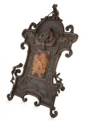 A JAPANESE BRONZE FRAME WITH B