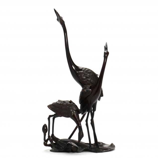 A JAPANESE BRONZE GROUP OF CRANES