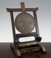 A Japanese bronze hand mirror