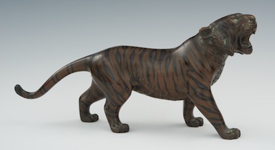 A Japanese Bronze Okimono of a