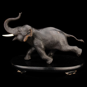 A Japanese Bronze Okimono of an