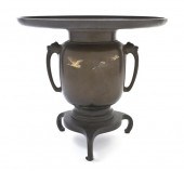 * A Japanese Bronze Tripod Vas