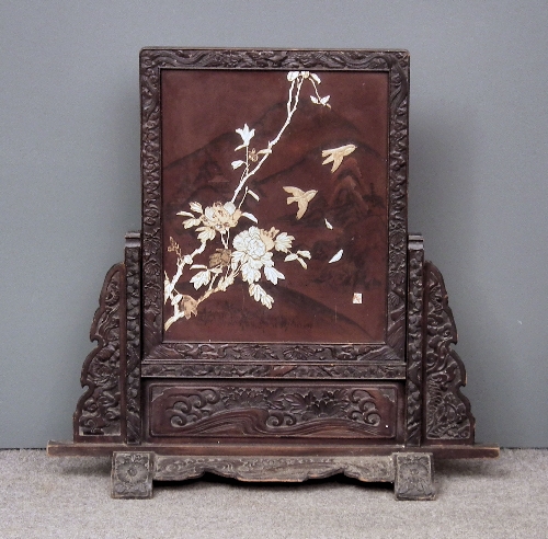 A Japanese carved and stained