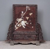 A Japanese carved and stained