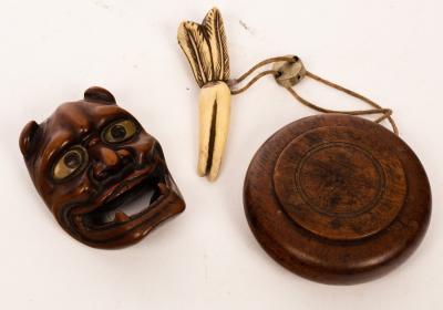 A Japanese carved boxwood Noh mask,