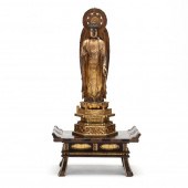 A JAPANESE CARVED GILDED WOOD