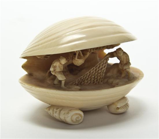 *A Japanese Carved Ivory Clam's