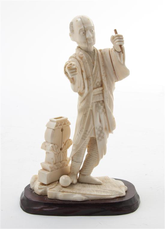 A Japanese Carved Ivory Okimono