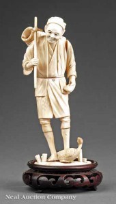 A Japanese Carved Ivory Sectio