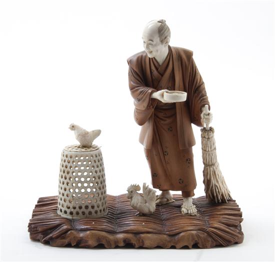 A Japanese Carved Wood and Ivory