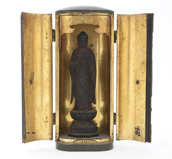 A Japanese Carved Wood Figure of