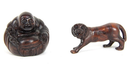 A Japanese carved wood netsuke