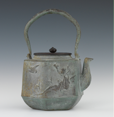 A Japanese Cast Iron Tea Kettle