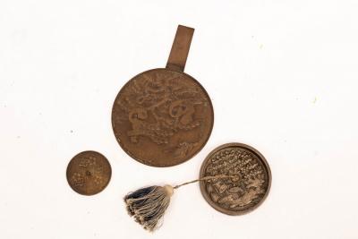 A Japanese cast metal mirror,