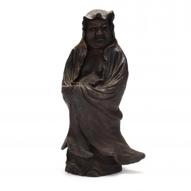 A JAPANESE CERAMIC SCULPTURE OF