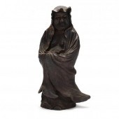A JAPANESE CERAMIC SCULPTURE O