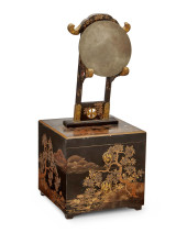A JAPANESE EBONIZED VANITY AND