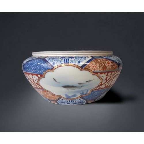 A JAPANESE IMARI PORCELAIN FRUIT