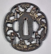 A Japanese iron tsuba (Soten S