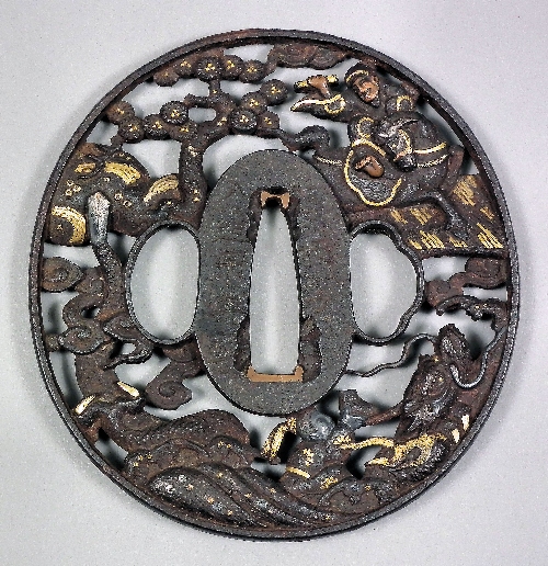 A Japanese iron tsuba (Soten