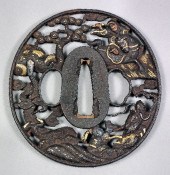 A Japanese iron tsuba (Soten S