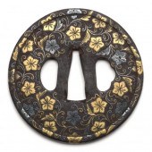 A JAPANESE IRON TSUBA WITH GOL