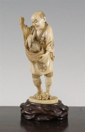 A Japanese ivory figure Meiji