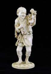 A Japanese ivory figure of a f